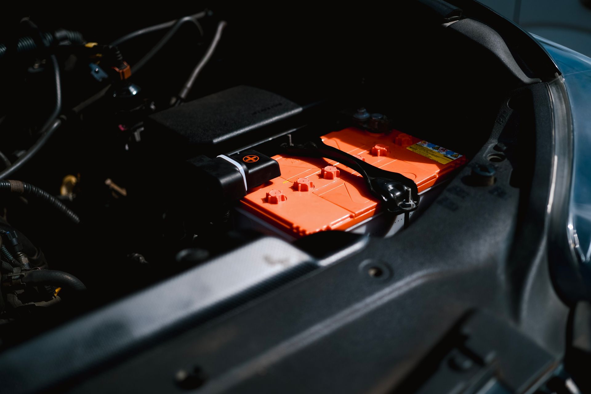 A car battery check in a car repair shop in Bossier City