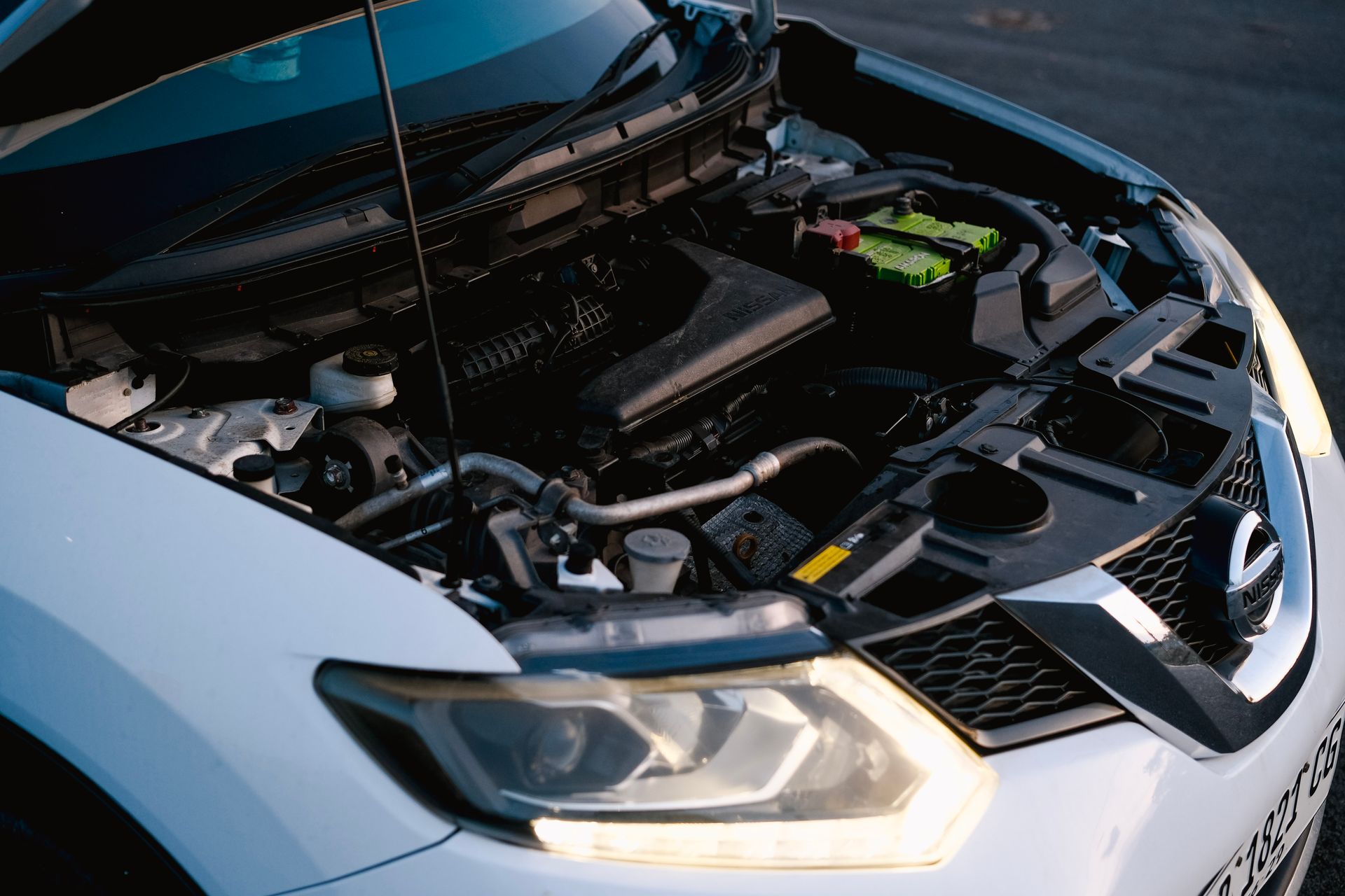 A car repair shop in Bossier City inspecting an engine bay