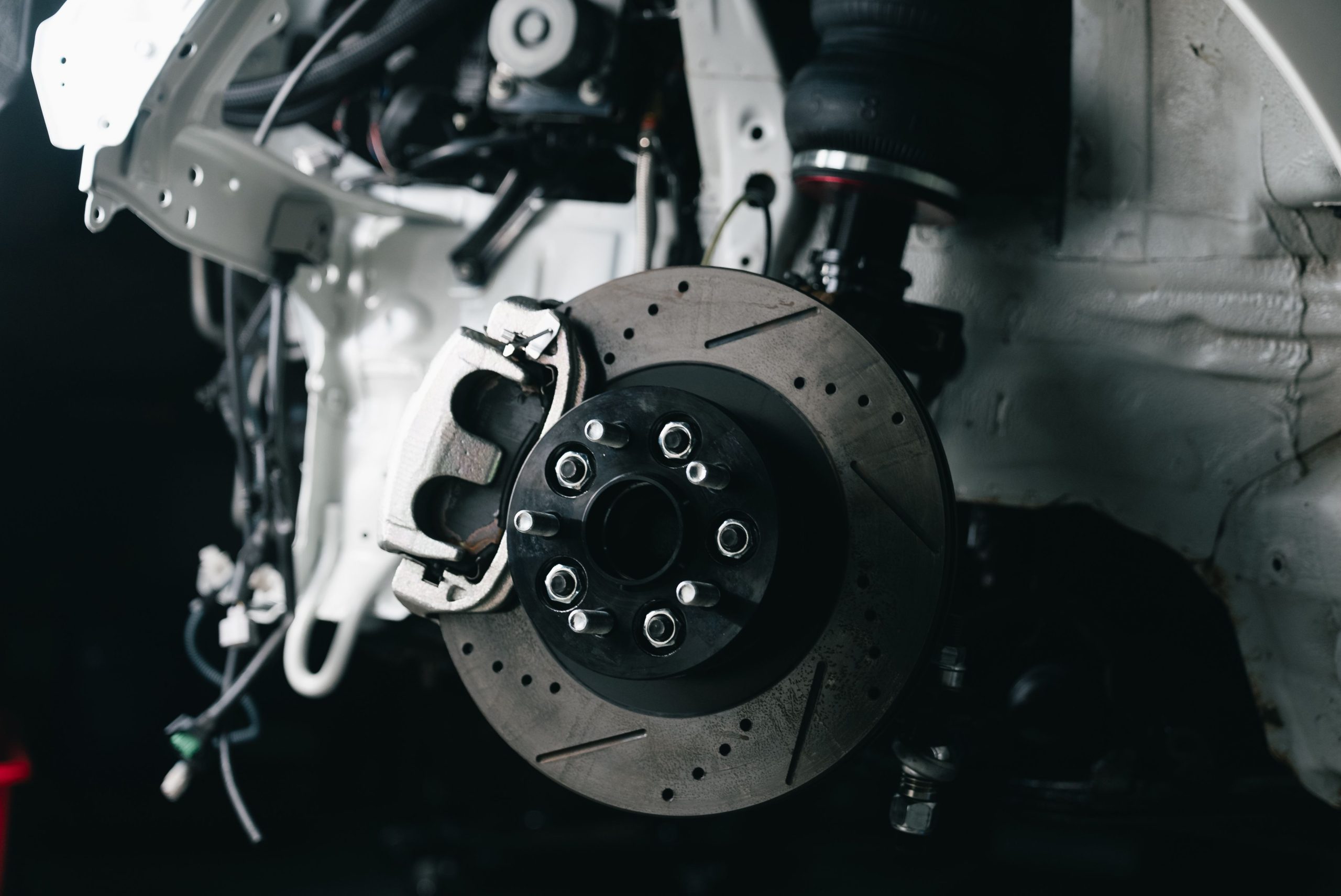 A brake system being repaired in a car repair shop in Bossier City