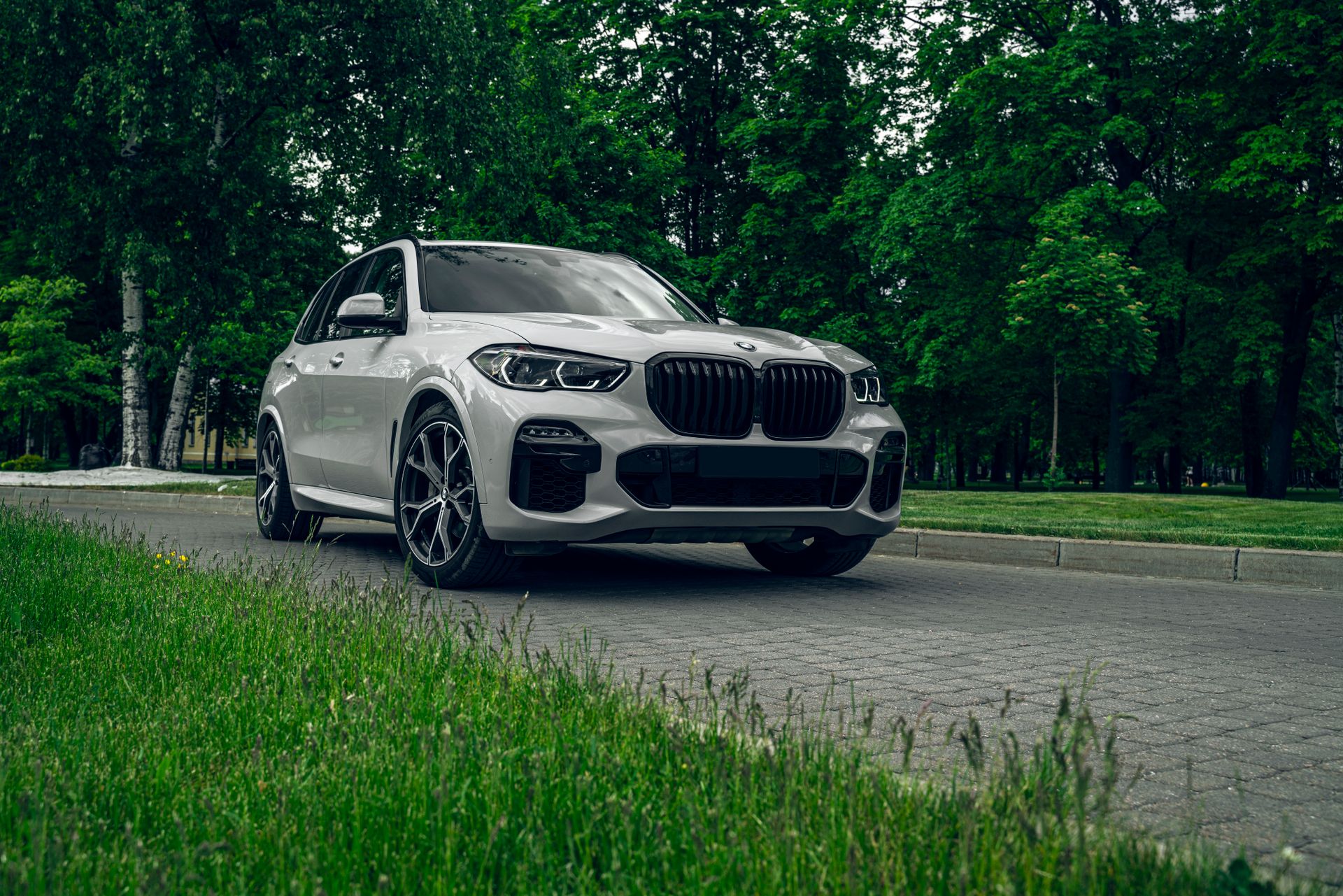 A BMW parked near a car repair shop in Bossier City