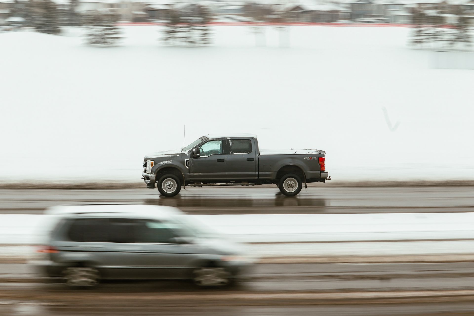 A diesel truck heading toward a car repair shop in Bossier City