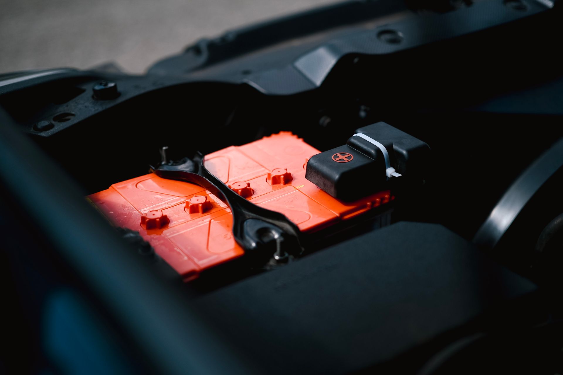 Car battery testing in an auto repair shop in Bossier City