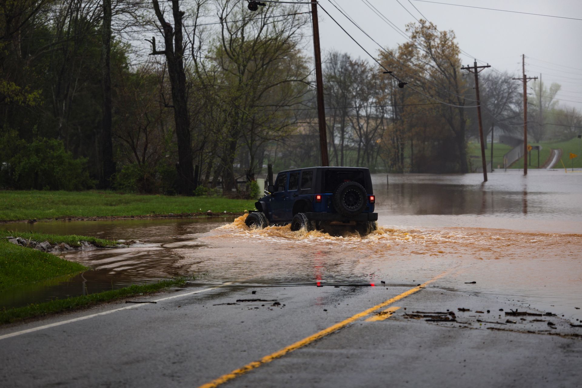 A truck in the middle of a flood in Bossier City