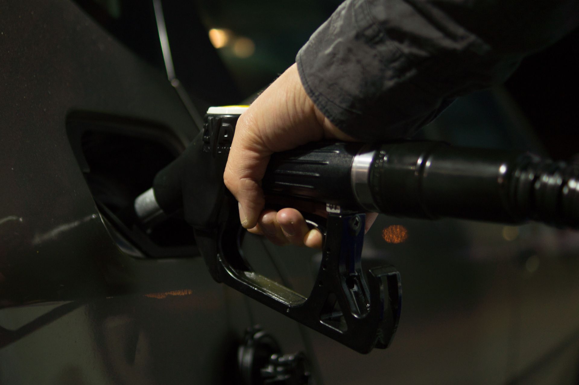 A man refueling a car in Bossier City