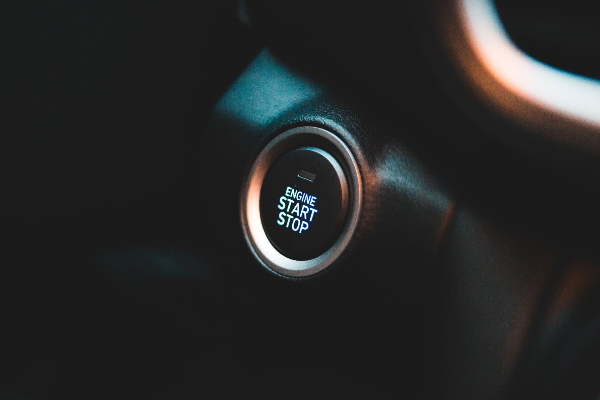 Engine start button in a car